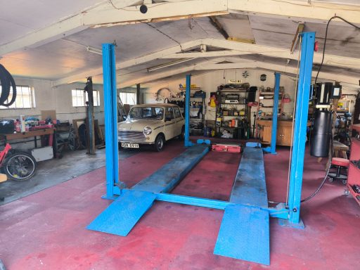 Large detached workshop with room for multiple vehicles